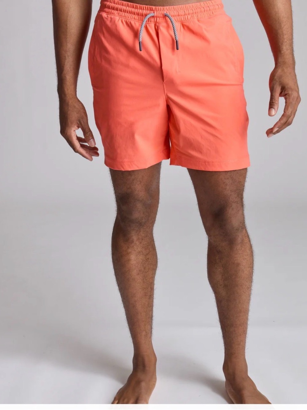 Birddogs lined Coral-Orange shorts w blue logo, sz M, great condition!